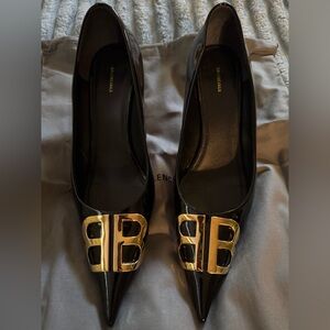 Balenciaga Black Pointed Toe Heels with Gold Logo Detail